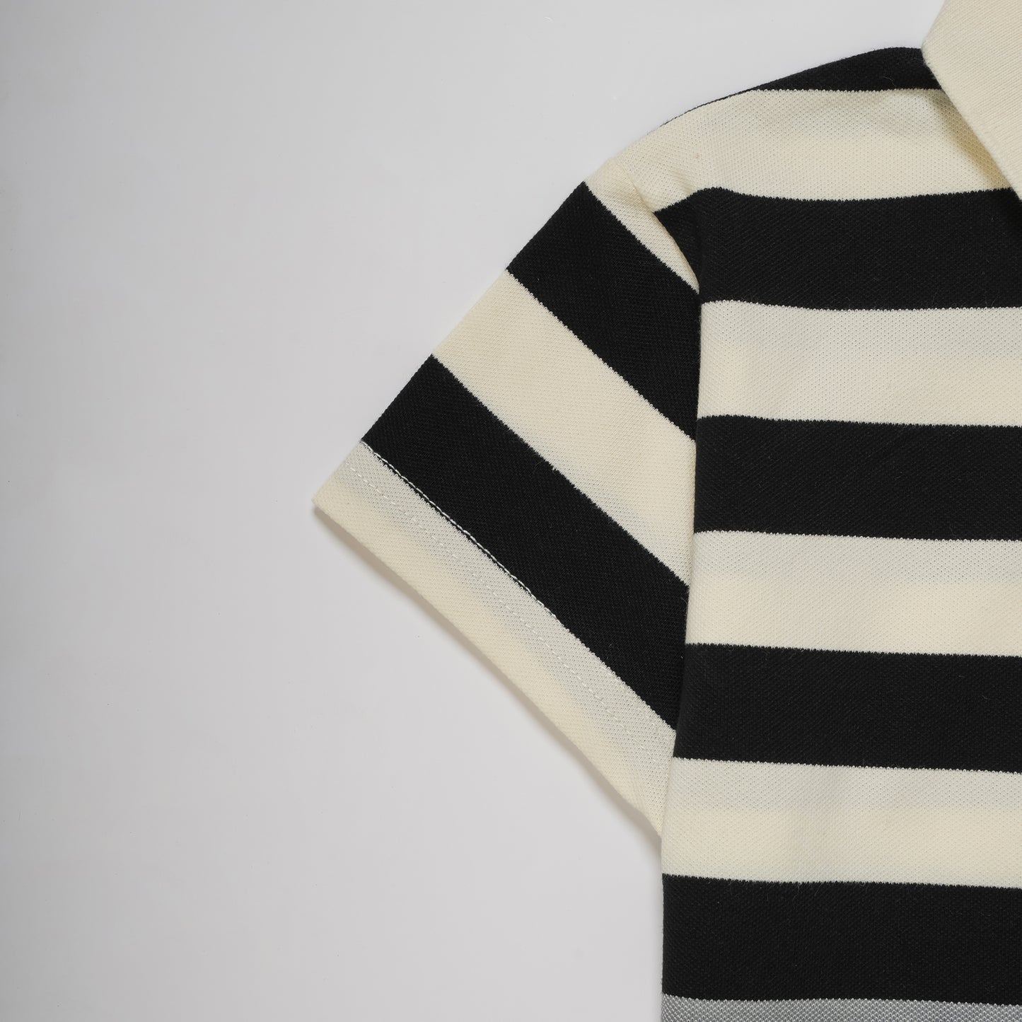 STRIPED POLO BLACK OMREY